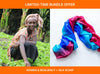 Split image showing a smiling woman in a peach polka-dot top and headwrap sitting in a lush green garden on the left, and a vibrant pink, blue, and purple silk scarf is on the right. Text that says limited-time bundle is written at the top of the image. At the bottom, text reads Women & Resiliency + Silk Scarf.